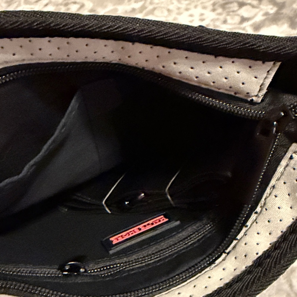 Haute shore brand.  Trendy Black and Gray Crossbody Bag with Pink Accents - Picture 5 of 8